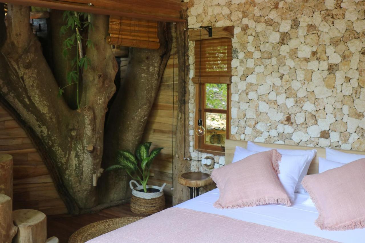 Villa Roots Tree House à Uluwatu Extérieur photo