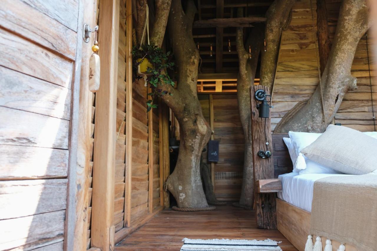 Villa Roots Tree House à Uluwatu Extérieur photo