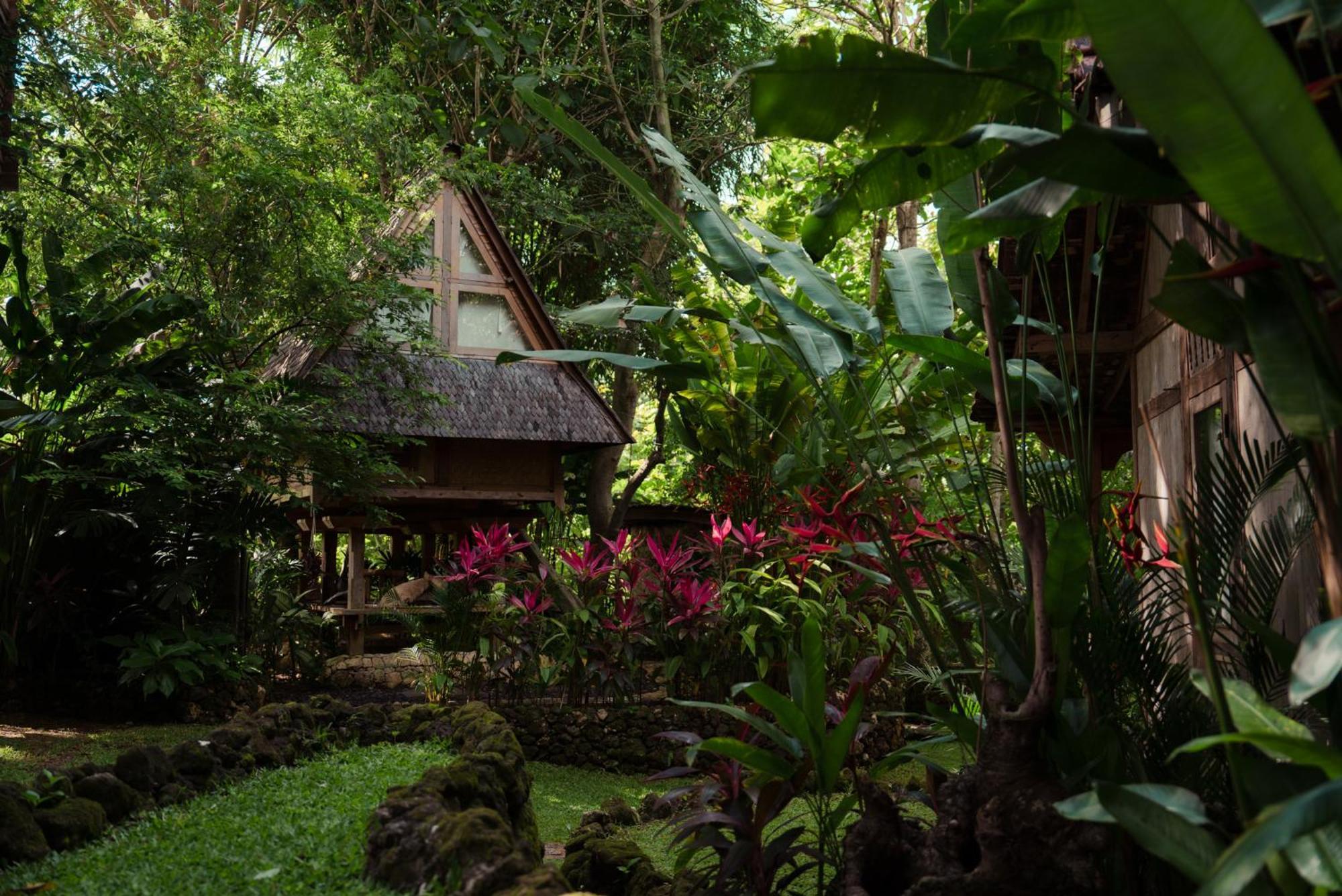 Villa Roots Tree House à Uluwatu Extérieur photo